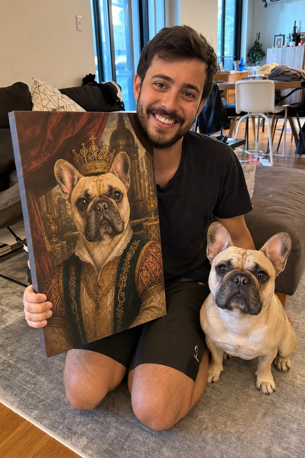 Customer with his French bulldog holding its custom royal pet portrait canvas